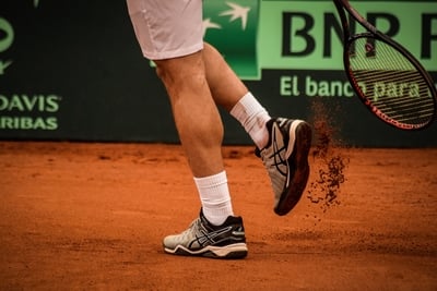 tennis player on clay court