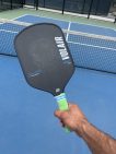 shows wear and tear in the center area where the ball is hit the most