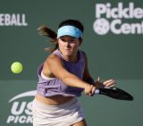 Anna Bright hitting a pickleball