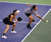 two pickleball players on the court
