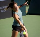 pro player hitting a pickleball at tournament