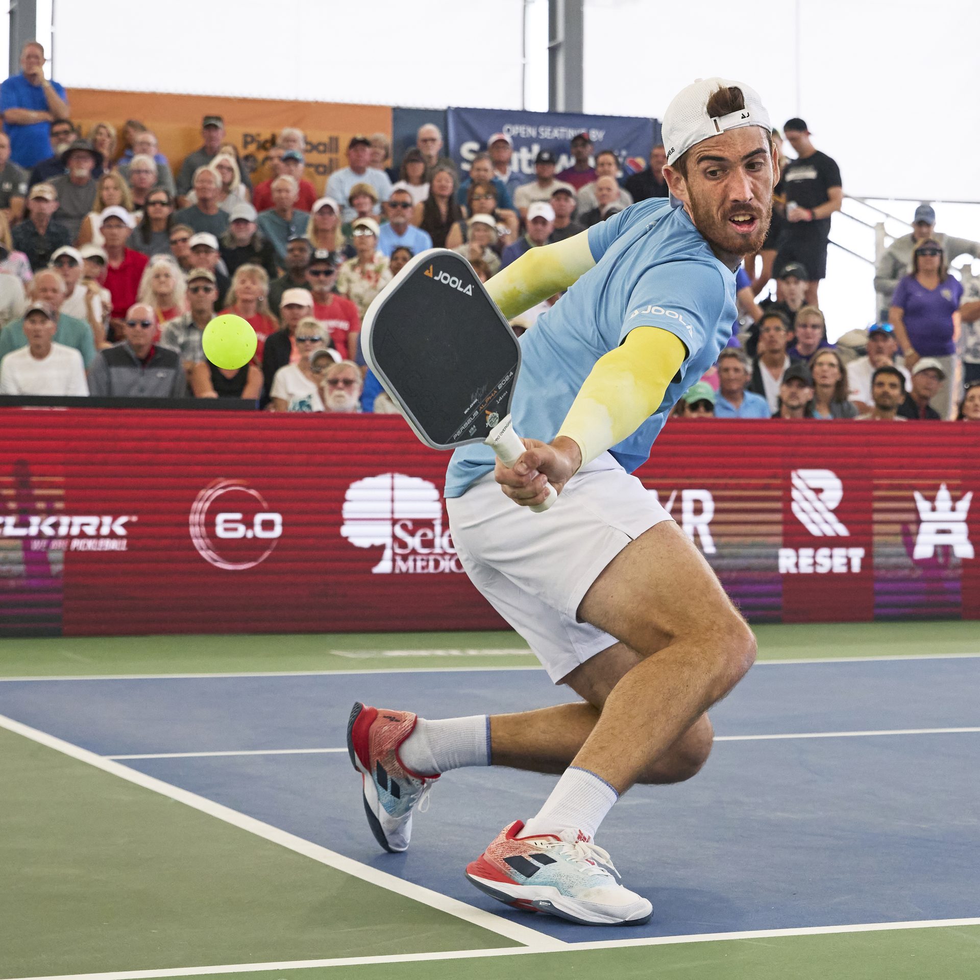 Fedrico Staksrud reaching for a Pickelball
