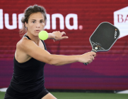 lea jansen hitting a pickleball